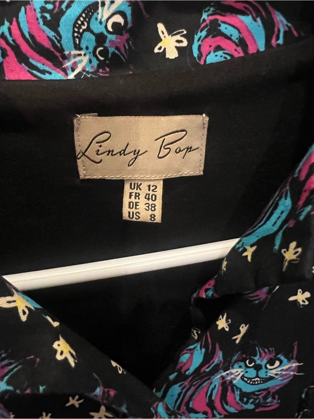 Lindy Bop Black Cheshire Cat Dress with Teal, Magenta & Cream Print